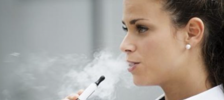 young woman vaping