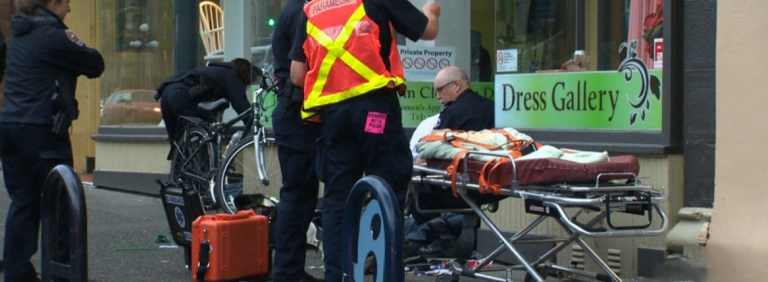 street scene with first responders to an overdose