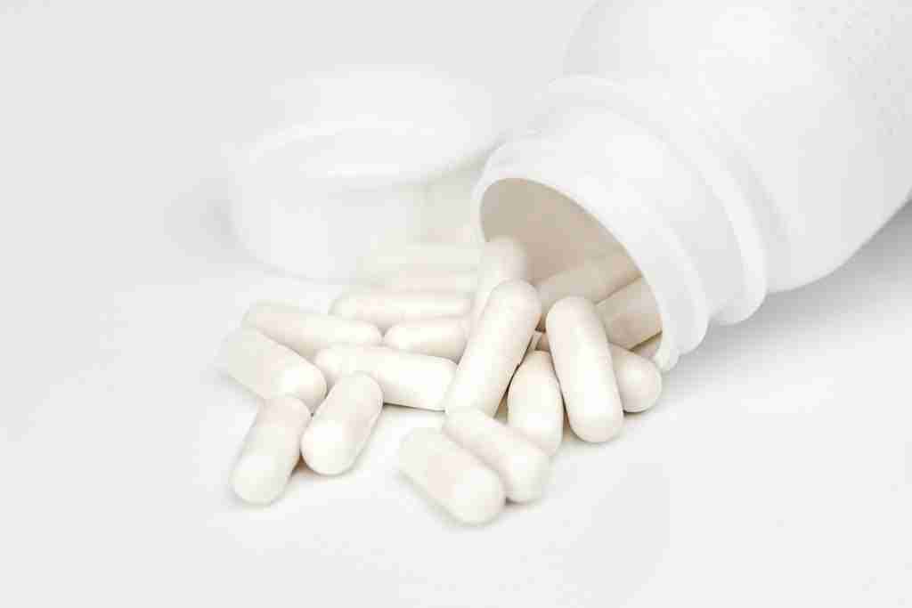 capsules spilling from a bottle
