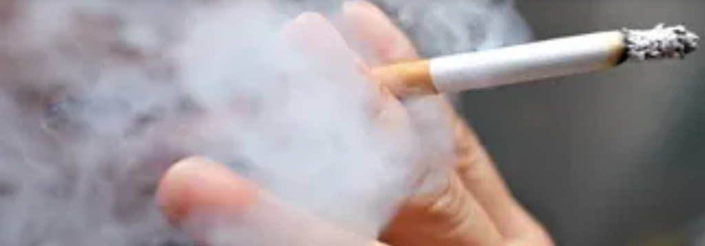 hand holding cigarette