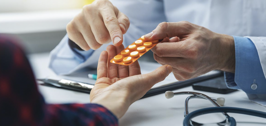 doctor prescribing pills