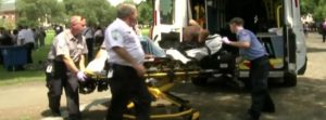 overdose victim being loaded into an ambulance