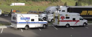 Two ambulances responding at an interstate highway wayside