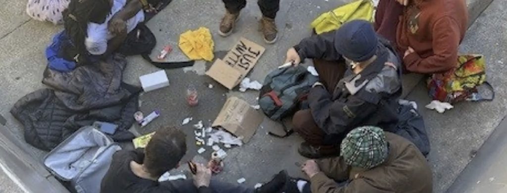 Group of drug users sitting together