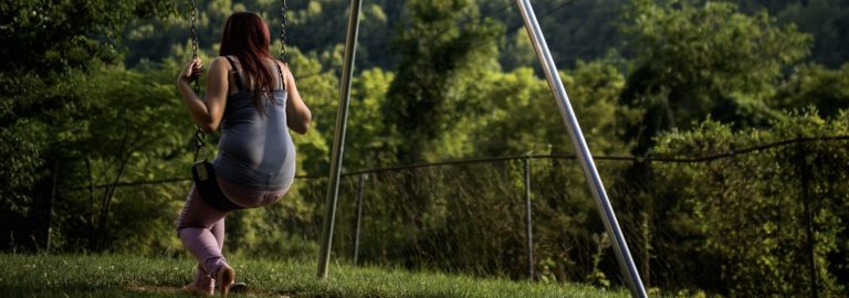 teenaged girl on a swing