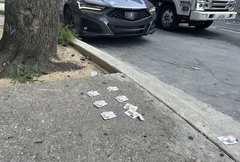 Image of Narcan units on a city sidewalk