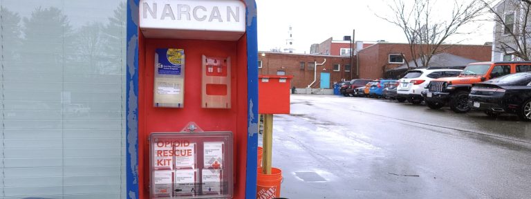 image of a Narcan dispensing box on a city street