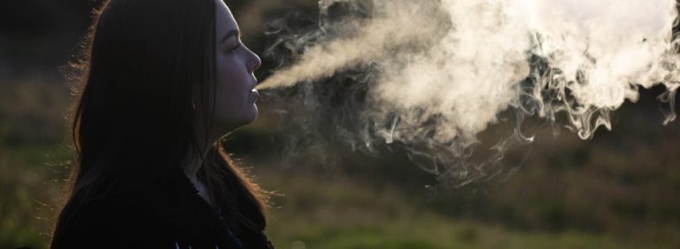 image of a girl vaping