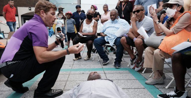 image of an insructor training community members on use of Narcan